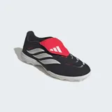 Championes de fútbol Adidas Predator League para pasto sintético, color negro con detalles en plateado y lengüeta plegable roja. Incorporan tecnología Nanostrike para mayor precisión y PowerSpine para estabilidad en el mediopié.