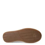 Championes urbanos de mujer con diseño de plataforma, color blanco con suela de goma color caramelo y detalle de estampado animal print en el talón.