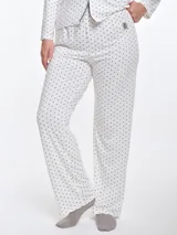 Pantalón de dormir de corte recto y calce relajado, confeccionado en viscosa con elastano de tacto suave. Presenta cintura elastizada para mayor comodidad y fluidez en la caída.