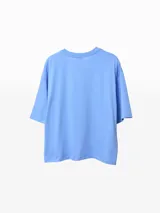 Remera celeste con estampado de Nemo y texto en color naranja.