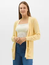 Cardigan abierto de tejido acanalado, con bolsillos frontales y mangas largas de corte entallado con puños de rib.