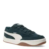 Championes urbanos Puma modelo Park Life Style SK8, color negro con detalles en blanco. Presentan un diseño de corte bajo con capellada de gamuza sintética, suela de goma en tono crema con base marrón y cierre mediante cordones.