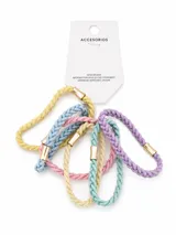 Pack de coleros para el pelo con diseño trenzado en colores pastel, cada uno con un detalle metálico dorado.