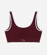 Top tipo bralette sin aros ni copas, color beige claro, con escote cuadrado y tirantes medianos. Presenta una banda inferior texturizada con doble línea horizontal.