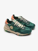 Championes Satorisan modelo Chacrona Linen, de color verde con detalles en beige, naranja y salmón, confeccionados en lino y cuero, con suela chunky moteada y cordones bicolor.