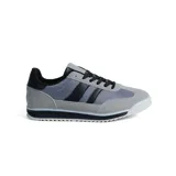 Championes deportivos American Sport modelo Itu, color gris con detalles en negro y azul. Presentan capellada de malla y gamuza sintética, con tres franjas negras en los laterales y suela de goma con diseño dentado.