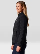 Campera técnica Mountain Hardwear modelo Stretchdown, color negro, con aislamiento de plumón de ganso. Presenta cierre frontal de dos vías, cuello alto, bolsillo en el pecho con cierre y bolsillos laterales. Diseño elástico con costuras selladas para mayor libertad de movimiento.