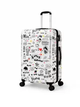 Valija rígida de color blanco con estampado tipo grafiti en negro y rojo. Cuenta con cuatro ruedas multidireccionales, asa telescópica y asa lateral para facilitar el transporte.