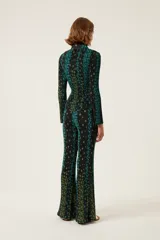 Pantalones acampanados de tejido plisado con estampado floral y cintura elástica.