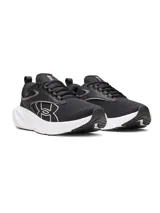 Championes Under Armour modelo Surge 5 de color negro, con parte superior de malla transpirable, suela gruesa de amortiguación blanca y el logotipo de la marca delineado en blanco en el lateral.