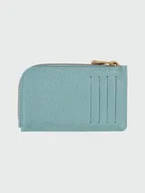 Tarjetero Longchamp de la línea Le Foulonné, confeccionado en cuero granulado negro. Presenta un diseño compacto con cierre superior de cremallera metálica dorada y logo de la marca grabado en el frente.