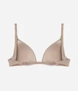 Sostén color nude de microfibra, modelo media taza con copas estructuradas y base reforzada. Cuenta con tirantes ajustables transparentes y cierre posterior.