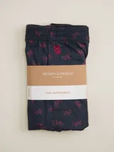 Boxer de algodón azul marino con estampado de bicicletas rojas y logo de la marca bordado en rojo.