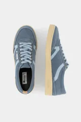 Zapatillas Morrison modelo Nineties color beige con detalles en celeste y estampado tribal. Fabricadas en serraje con suela color vainilla y cordones finos de algodón beige.