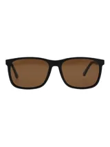 Lentes de sol con marco de acetato de celulosa biodegradable color negro y cristales polarizados color marrón con protección UV.