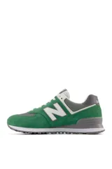 Championes deportivos New Balance modelo 574, color verde con detalles en gris y blanco, confeccionados en gamuza y malla, con el logotipo "N" característico en los laterales y entresuela ENCAP.