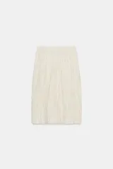 Falda midi de punto con diseño de efecto arrugado y cintura elástica.