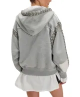 Hoodie gris de algodón y poliéster con capucha, bolsillo canguro y estampado frontal con las letras "L.A.". Presenta apliques de pedrería en forma de rombos a lo largo de las mangas y en el borde de la capucha.