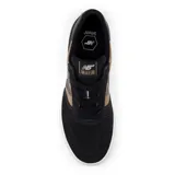 Championes New Balance Numeric 272, diseñados para skate, con combinación de gamuza y materiales sintéticos en color negro y marrón. Presentan el logo N en el lateral, suela blanca de gran flexibilidad y agarre, y plantilla Ortholite para mayor amortiguación.