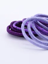 Pack de 12 coleros elásticos para el cabello con acabado brillante, en degradado de tonos violeta y morado.