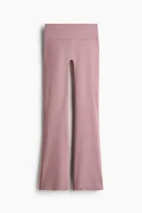 Leggings deportivas de tiro alto con diseño acampanado, confeccionadas en tejido funcional suave con tecnología de absorción de sudor y cintura ancha plegable.