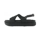 Sandalias bajas color ladrillo con tiras anchas cruzadas en el empeine y tira trasera con hebilla.