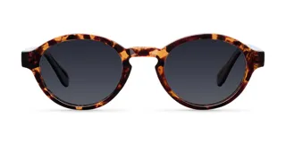 Lentes de sol con montura redonda de diseño retro, con armazón estampado en carey y cristales polarizados en color negro.