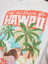 Remera amarilla de algodón con corte oversized y estampado en el frente.