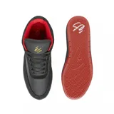 Zapatillas de skate éS Stylus Mid, color negro con detalles en rojo y logo dorado.