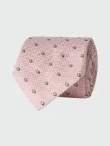 Corbata Boss de seda con diseño de microestampado de puntos oscuros sobre fondo rosado texturizado.