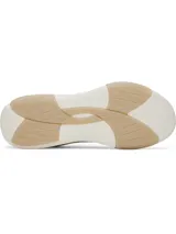 Championes de entrenamiento Under Armour modelo W Sculpt TR, color blanco con detalles en beige. Presentan una parte superior de micromalla transparente con diseño abstracto impreso en 3D, lengüeta de una sola pieza y entresuela de EVA con suela de goma.