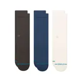 Pack de tres pares de medias de caña media Stance, modelo Icon. Incluye un par negro, un par azul marino y un par blanco. Presentan tejido acanalado en la parte superior, logo bordado sutil en el lateral y detalle de marca en la puntera.