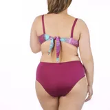 Soutien de baño con aro, breteles regulables y estampado con hojas de palmera en tonos rosa, celeste y blanco. Confeccionado con tela que contiene fibra LYCRA® XTRA LIFE™.