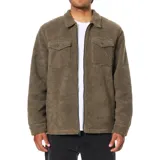 Campera de sherpa color marrón con cierre frontal, cuello camisero y dos bolsillos frontales con solapa y botón. El interior del cuerpo está forrado en franela y las mangas en tafetán.