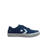 Championes Converse Stoke OX color azul marino con detalles en blanco, de corte bajo y suela de goma.