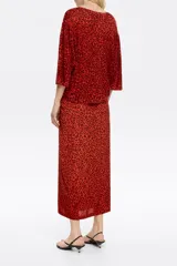 Falda midi de viscosa con estampado animal print color rojo y abertura lateral.