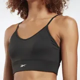 Top deportivo negro de Reebok, con tirantes finos cruzados en la espalda y logo de la marca en el frente.