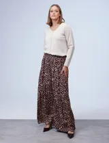 Pantalón palazzo de crepe estampado, marca Cupio, con pretina trasera elastizada, plisado delantero y bolsillos laterales.