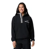 Polar de sherpa color negro Columbia, modelo Helvetia II Cropped, con cuello alto abotonado con broches, ribete en contraste y bolsillo frontal con cierre en el pecho.
