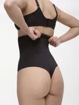 Colaless de lycra color beige con cintura alta de encaje.