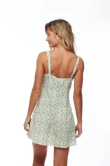 Vestido corto con estampado floral, breteles finos y corte evasé.