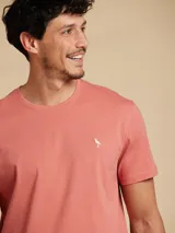 Remera amarilla de algodón con cuello redondo y manga corta.