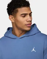 Buzo hoodie negro de la marca Nike Jordan, con logo Jumpman bordado en blanco en el pecho y bolsillo tipo canguro.