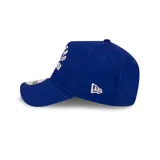 Gorra azul con visera curva y logo bordado de los LA Dodgers en el frente.