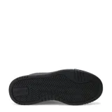 Championes urbanos Puma modelo Caven III, color negro con detalles en plateado. Presentan una silueta clásica de inspiración retro, con perforaciones en la puntera para mayor ventilación y suela de goma resistente.