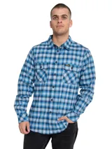Camisa de manga larga Caterpillar a cuadros en tonos de azul y blanco, con cuello clásico, cierre frontal de botones, dos bolsillos con solapa en el pecho y calce regular.