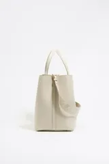 Bolso tote Bimba y Lola modelo Chihuahua, color beige, con doble asa corta y correa larga extraíble con logo de la marca.