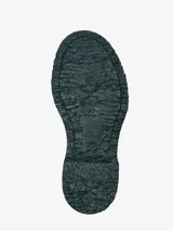 Mocasín Camper Twins de cuero negro con detalle de antifaz verde y gris.