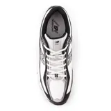 Championes New Balance modelo 509, de estilo retro running, en colores blanco, negro y gris. Presentan una capellada de cuero y malla, con el logo 'N' en el lateral y tecnología de amortiguación ABZORB en la mediasuela.