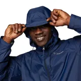 Campera impermeable Columbia modelo Glennaker Lake, color azul marino. Presenta cierre frontal completo, capucha oculta en el cuello, bolsillos laterales con cierre y puños ajustables. Diseño ligero y funcional con tecnología Omni-Shield para protección contra la humedad.